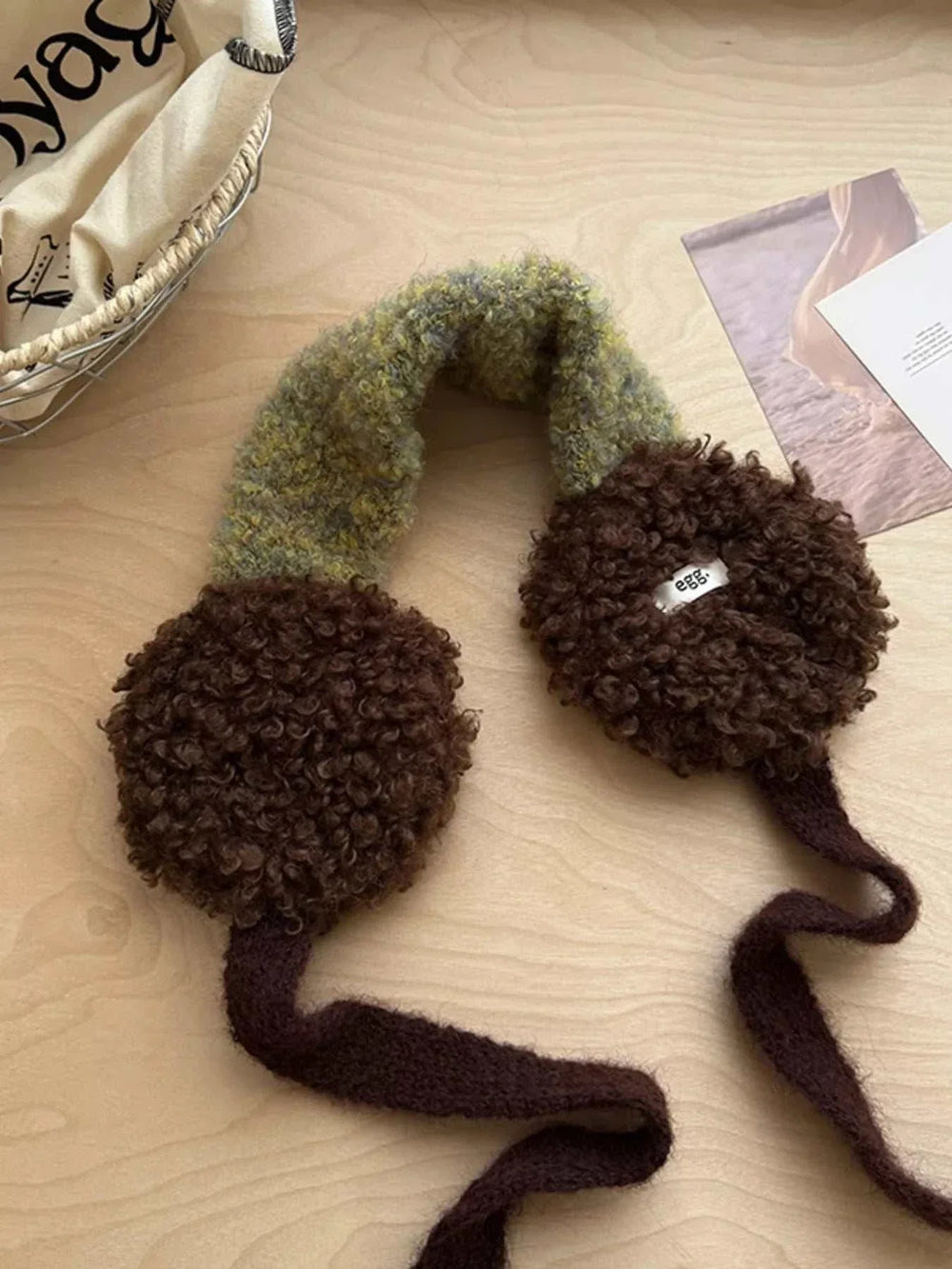 Women's Sherpa Earmuffs with plush sherpa texture and classic earmuff design for cozy winter wear