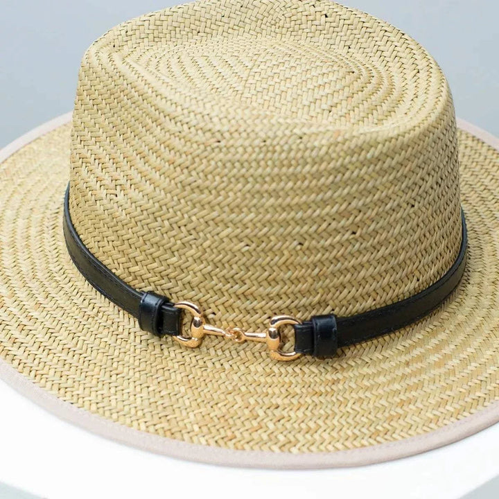 Women’s straw fedora hat with decorative band, classic summer accessory from Hot Topic Goods
