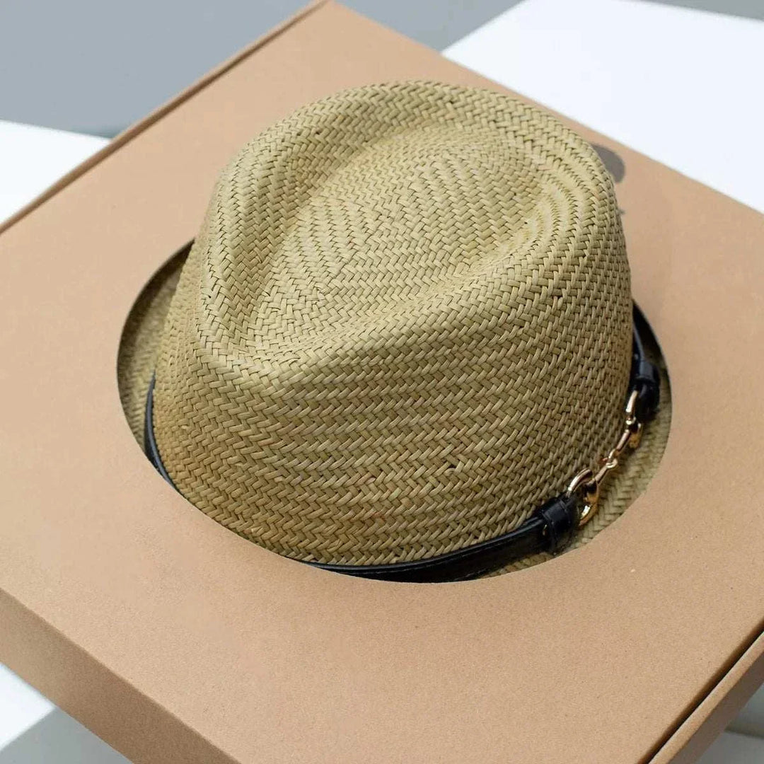 Women’s straw fedora hat with decorative band for warm-weather style and casual outfits