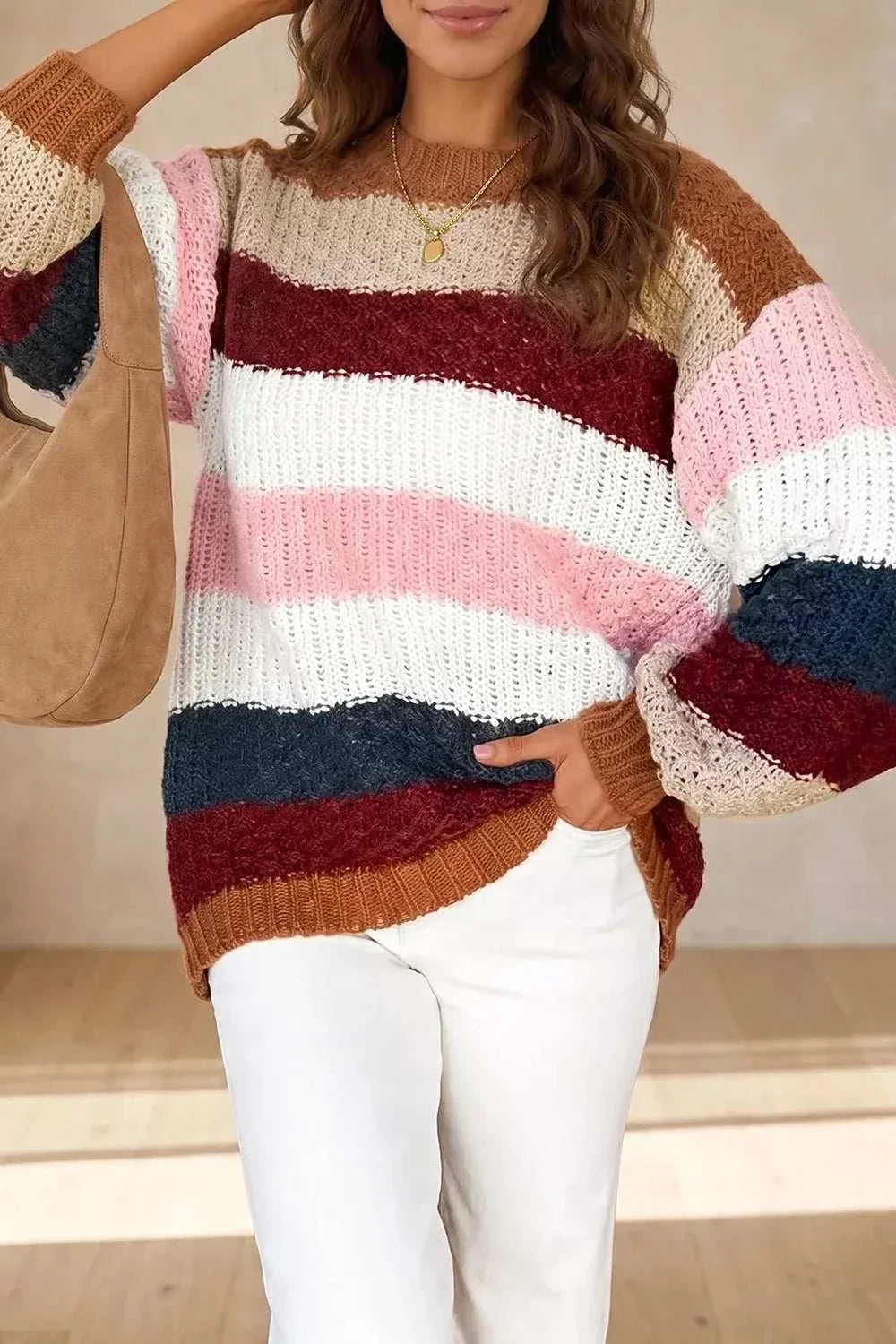Women’s striped knit sweater with dropped shoulders and round neckline from Hot Topic Goods