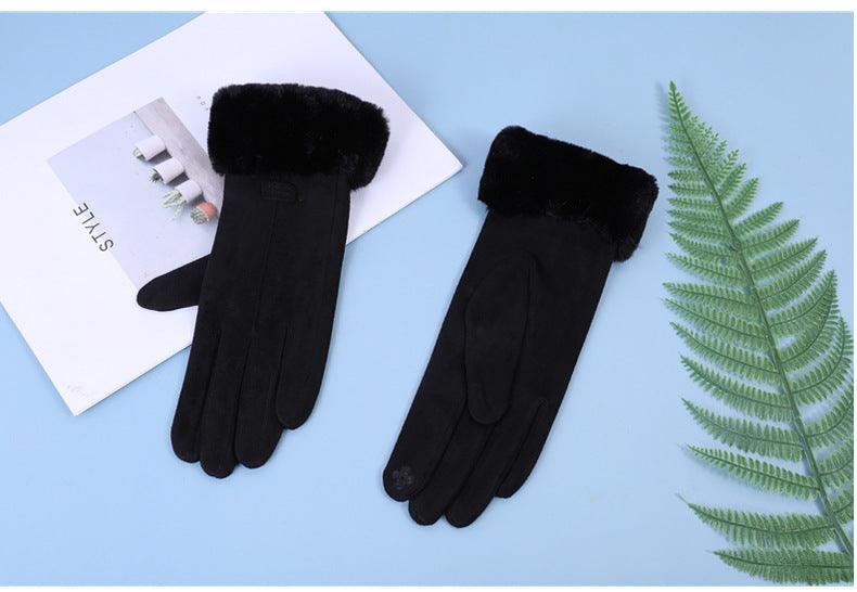 Pair of elegant women's suede winter gloves with classic feminine silhouette from Hot Topic Goods