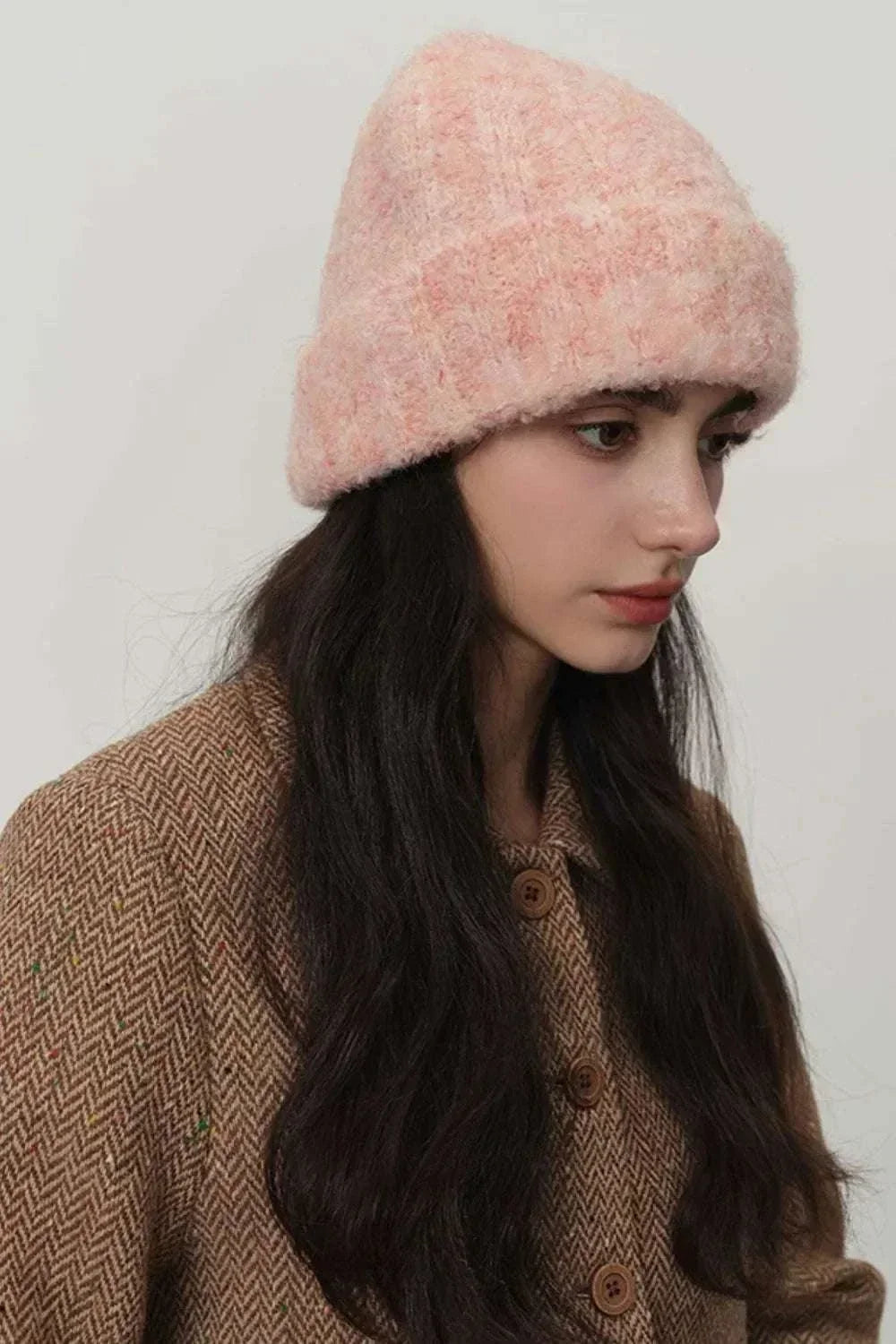 Women’s thermal knit winter hat in solid color with cozy knit texture for cold weather wear