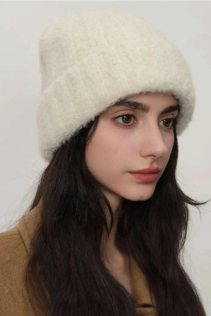 Women’s solid color thermal knit winter hat with cozy fur material by Hot Topic Goods