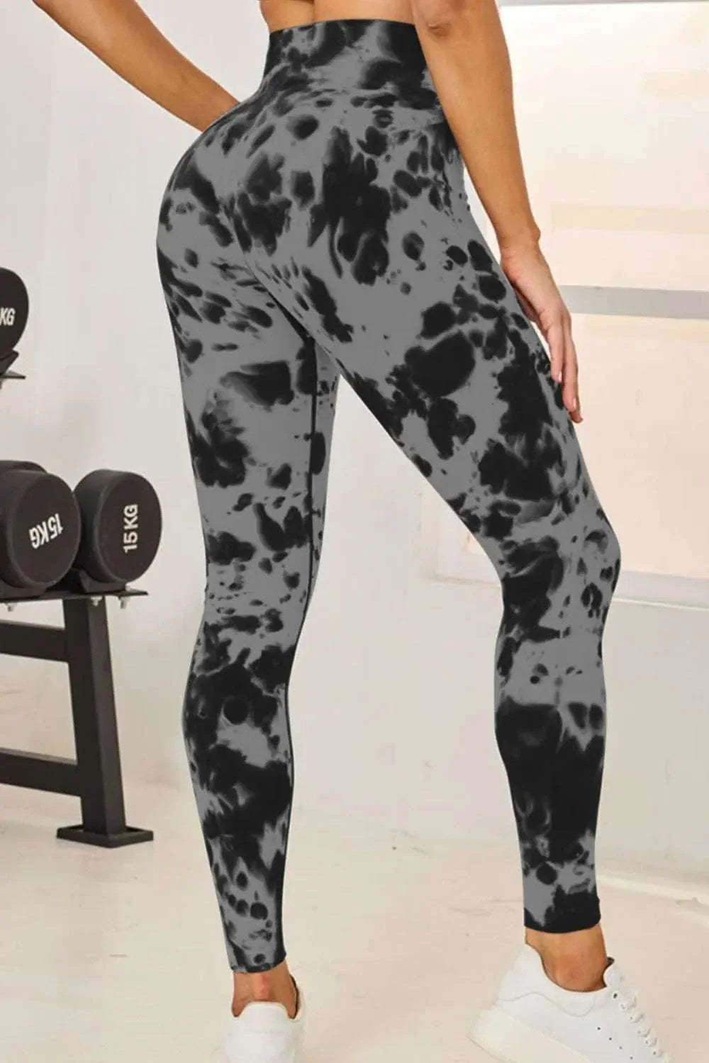 Women's tie-dye active leggings with high-waist and fitted silhouette from Hot Topic Goods