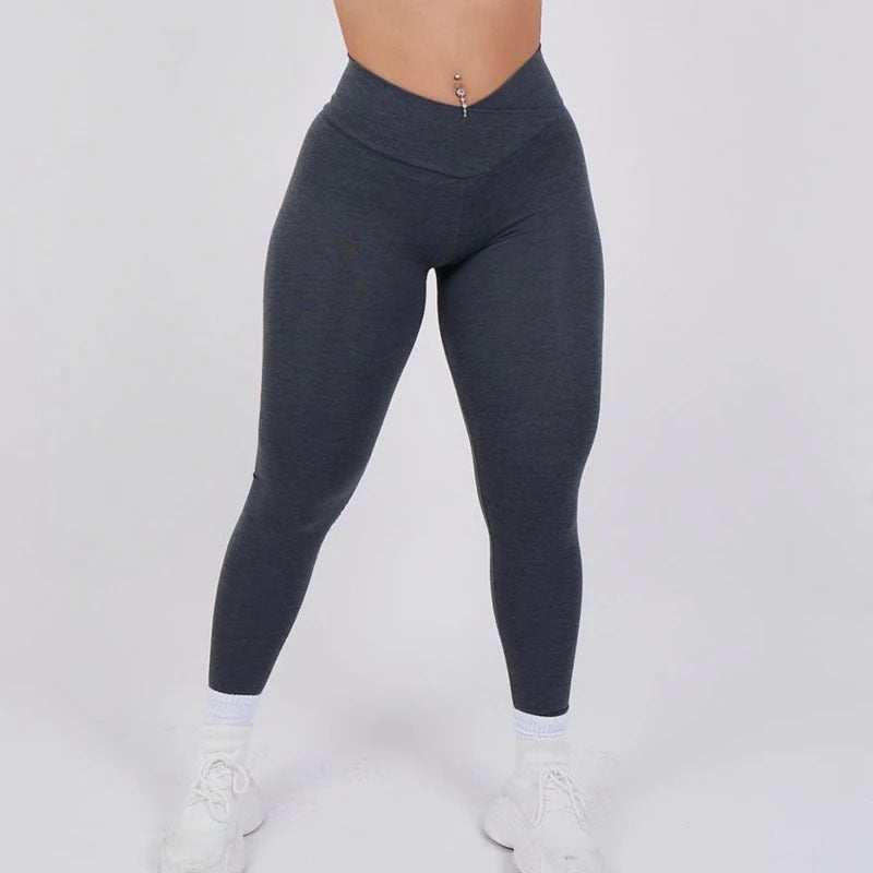 Women wearing high-waist moisture-wicking yoga workout leggings from Hot Topic Goods