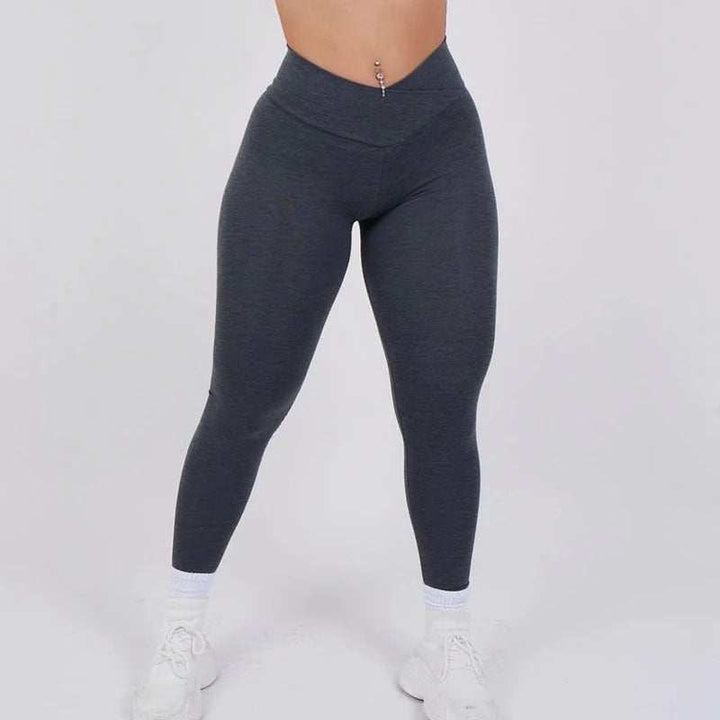 Women wearing high-waist moisture-wicking yoga workout leggings from Hot Topic Goods