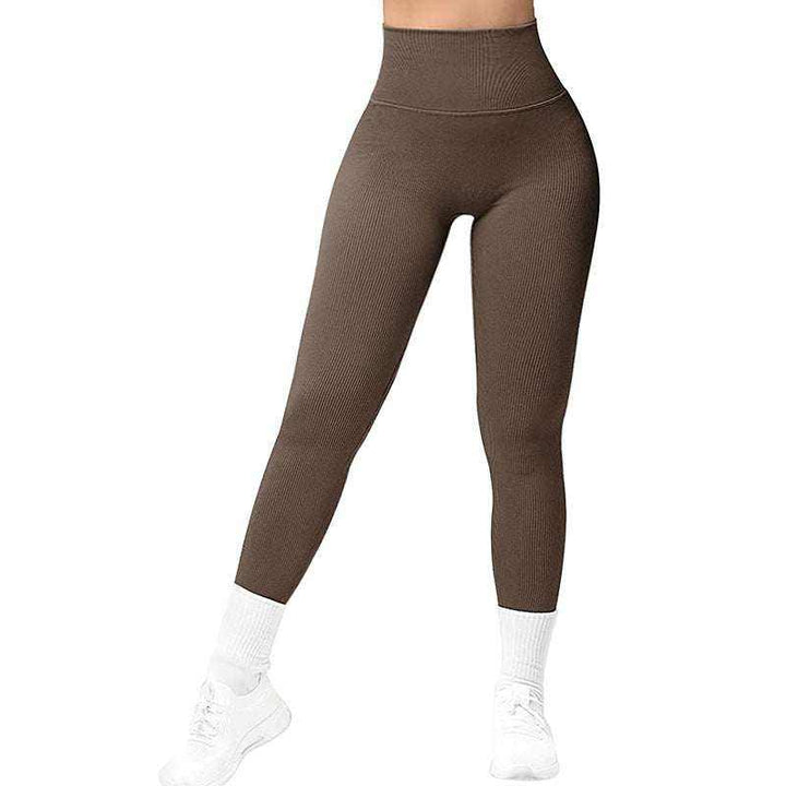 Woman wearing breathable yoga suit from Hot Topic Goods, stylish fitted workout set for yoga and casual wear