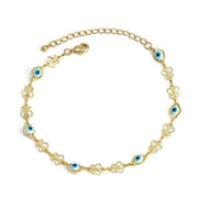 Elegant gold charm bracelet with blue eye motifs and adjustable chain clasp.
