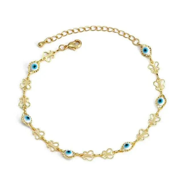 Elegant gold charm bracelet with blue eye motifs and adjustable chain clasp.
