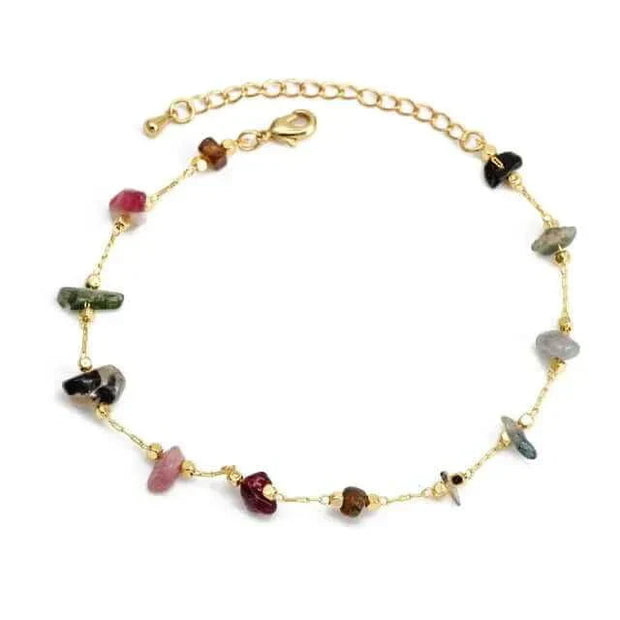 Colorful gemstone charm bracelet with adjustable gold chain.