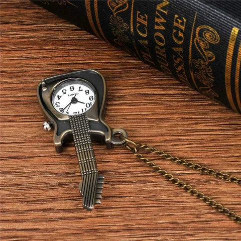 Steampunk Antique Watch with intricate gears and bronze alloy design on a wooden surface.