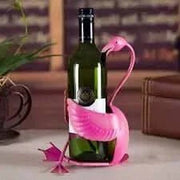 Flamingo Wine Holder displaying bottle on table, vibrant design, decorative home accessory.