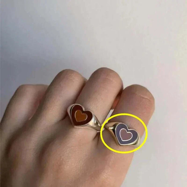 Creative Love Heart Ring with heart-shaped design on finger.