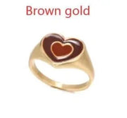 Brown gold heart-shaped ring with unique design, crafted from alloy with color retention electroplating.
