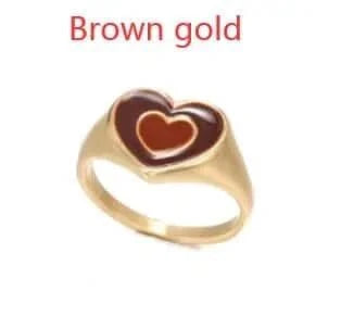Brown gold heart-shaped ring with unique design, crafted from alloy with color retention electroplating.