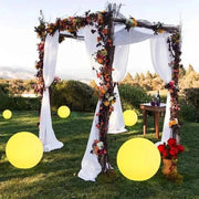 Waterproof Garden LED Lights Ball illuminating outdoor space with a decorative arch.