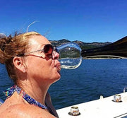 Creative Champagne Glass being used on a boat, showcasing its innovative design.