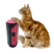 Cat next to a FurSweep pet hair remover brush with durable stainless steel teeth for grooming.