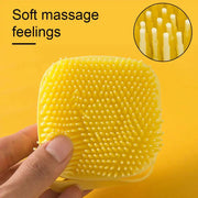 Soft Silicone Dog Brush with gentle yellow bristles for soothing pet grooming.