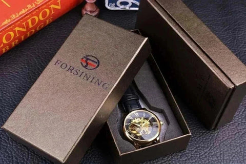 Men's luxury brand watch in an elegant presentation box showcasing exquisite design and craftsmanship.
