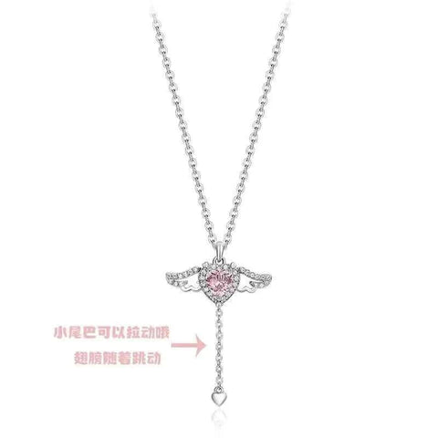 Heart Wings Necklace with delicate heart and wing design, symbolizing love and adventure.