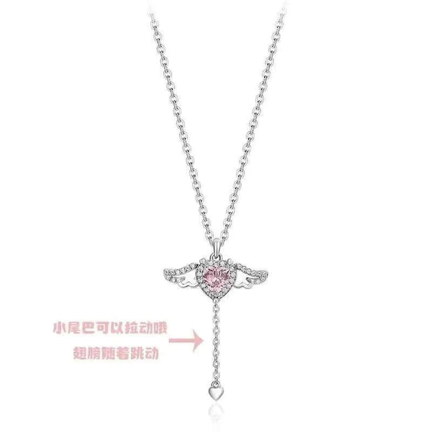 Heart Wings Necklace with delicate heart and wing design, symbolizing love and adventure.
