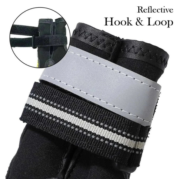 Waterproof reflective dog boots with adjustable straps and reflective hook and loop closure, ensuring visibility and a secure fit for safety and comfort.