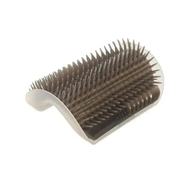 Cat corner groomer brush for feline self-grooming and hair removal.