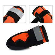 Waterproof reflective dog boots with adjustable straps and reflective strips for enhanced safety and comfort.