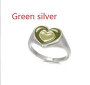 Creative Love Heart Ring in green and silver with a heart-shaped design.