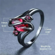 Stunning crystal ring with a red centerpiece and elegant design.