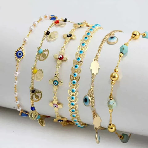 Charm bracelets with various colorful charms and designs.