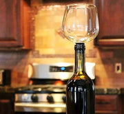 Creative Champagne Glass elegantly attached to a wine bottle, showcasing innovative design and sophistication.