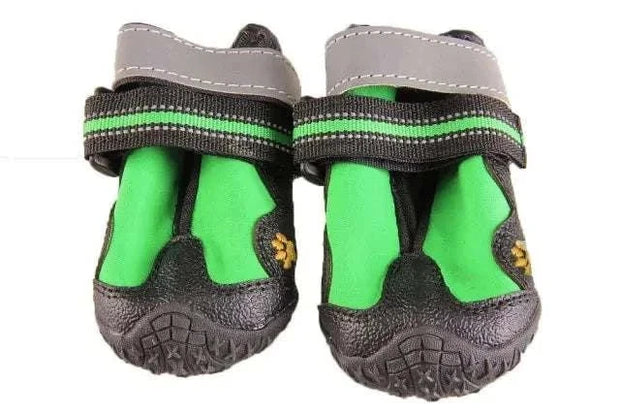 Waterproof reflective dog boots with adjustable straps and durable design.