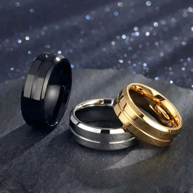 Gold electroplated ring with geometric design and titanium steel material, offering a sophisticated and modern style.