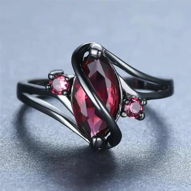 Stunning Crystal Ring with a dazzling red crystal centerpiece and elegant design.