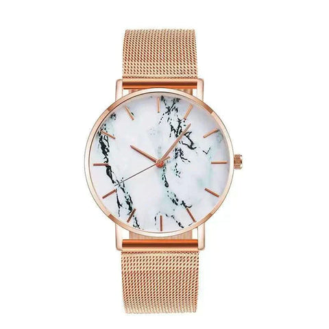 Rose Gold Mesh Band Marble Watch with white marble face and elegant design.