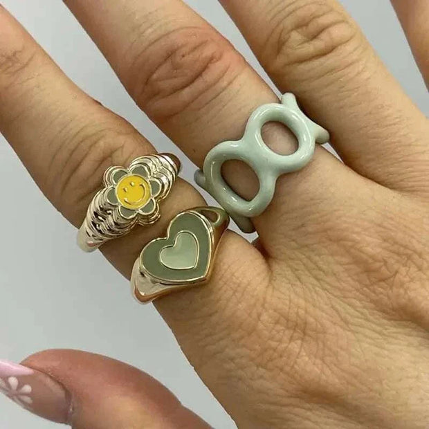 Creative Love Heart Ring on hand, showcasing unique heart-shaped design and quality alloy craftsmanship.