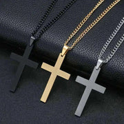 Elegant cross necklace in silver, gold, and black finishes, symbolizing faith and style.