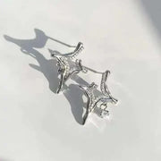 Asterism Rhinestone Earrings with unique geometric design and shimmering star-like rhinestones.