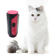 Pet hair remover brush beside a fluffy white cat, showcasing effective grooming tool.