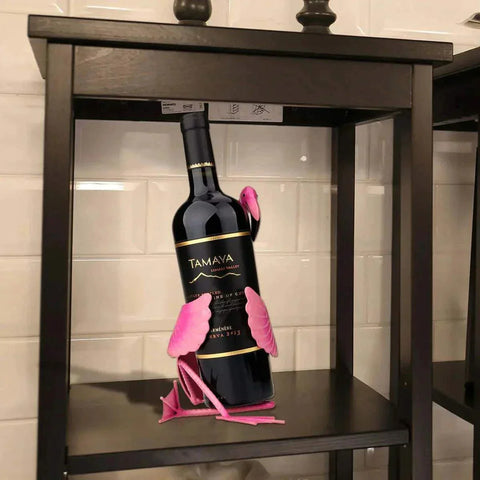 Flamingo Wine Holder showcasing wine bottle on shelf, vividly colored and eco-friendly design.