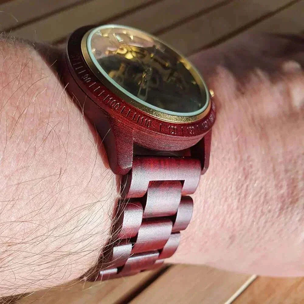 Wooden Mechanical Watch on wrist, showcasing intricate design and natural wood craftsmanship.