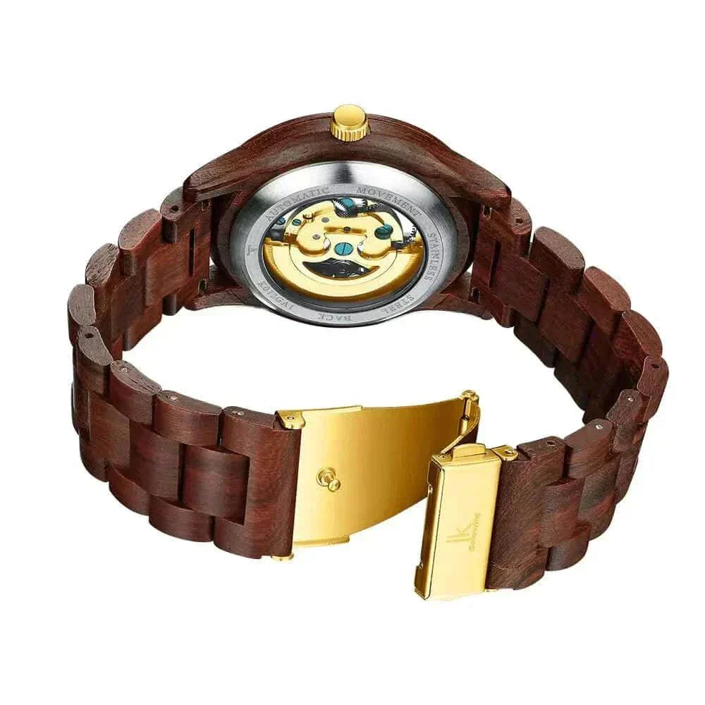 Wooden mechanical watch with a transparent case back showing gears and wooden strap.