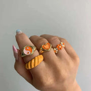 Creative Love Heart Ring showcasing unique heart-shaped design on finger.